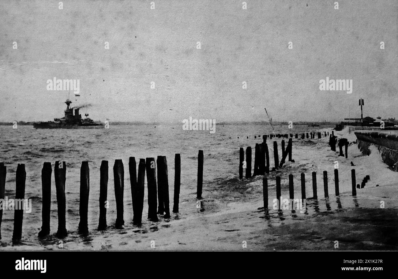 A view of a distant warship off the Southsea coast. HMS Iron Duke ...