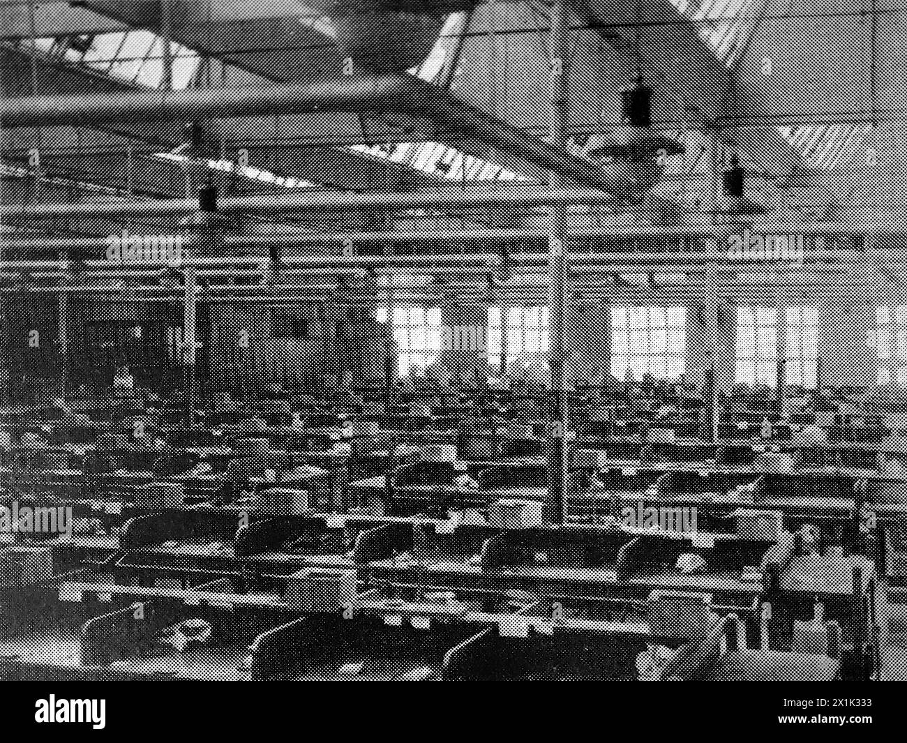 Part of the Hand Made Room at the Swindon factory. Based in Bristol, England, W. D. and H. O. Wills was one of the largest British tobacco products manufacturers. By 1924 they were a part of the Imperial Tobacco Group of Great Britain and Ireland but still had a certain amount of autonomy. The company was also a prolific publisher of cigarette cards. Stock Photo