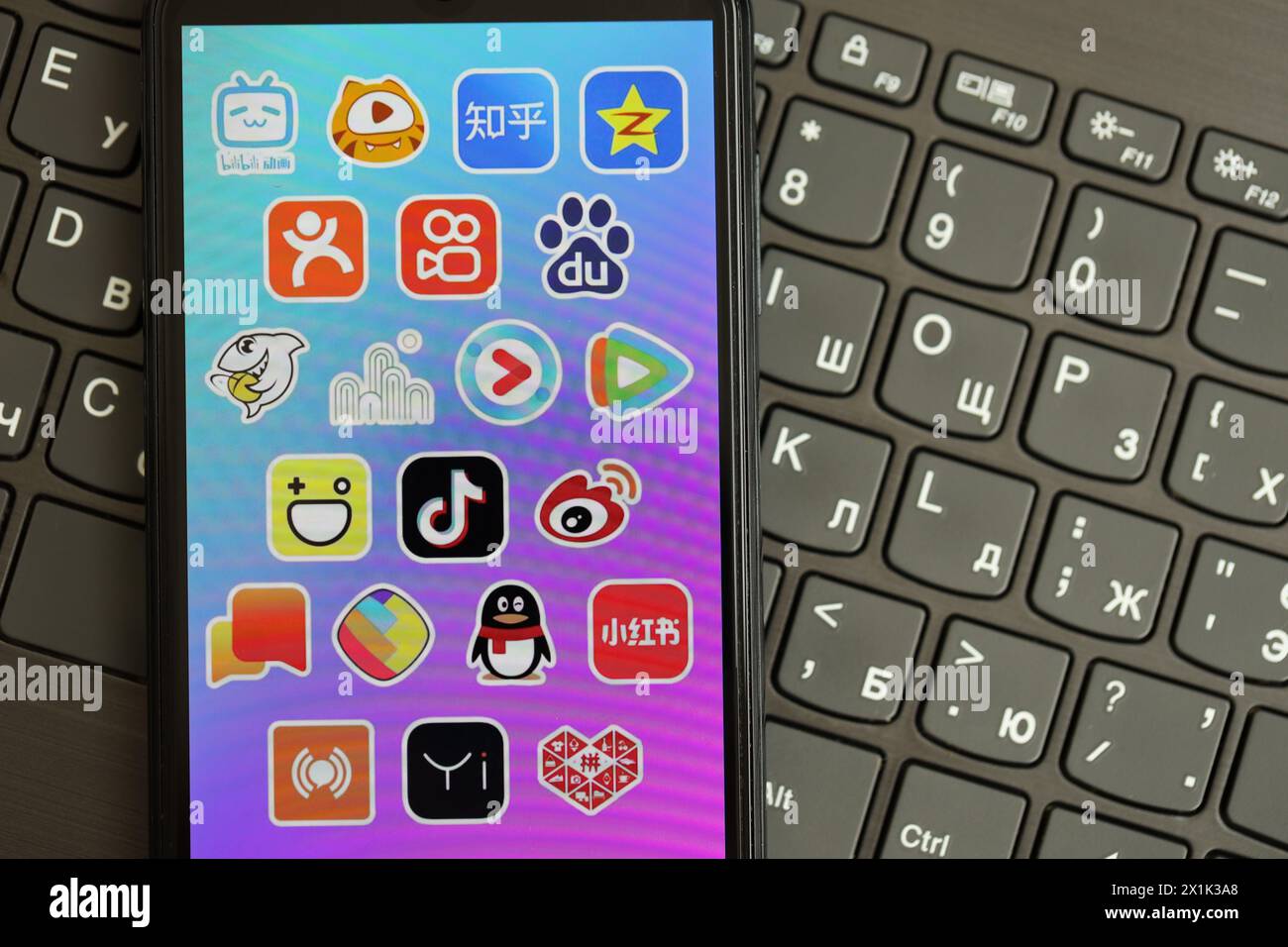KYIV, UKRAINE - APRIL 1, 2024 Asian apps icon on smartphone screen on ...
