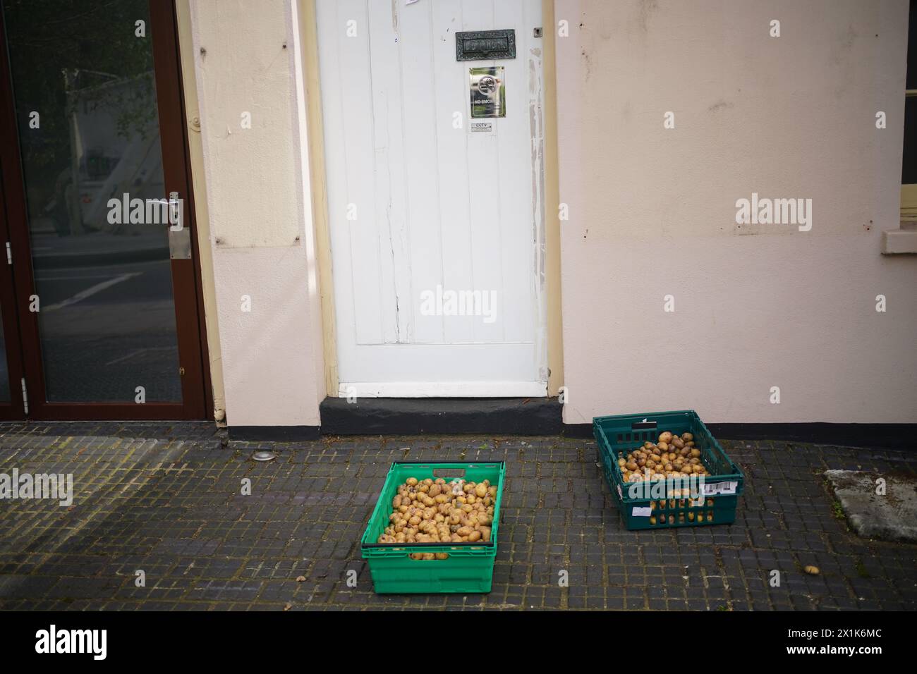 Boxes of potatoes outside the York & Albany pub near Regent's Park, London. Squatters have taken over the Gordon Ramsay pub which is currently up for sale with a guide price of £13 million. The group locked themselves inside the Grade II-listed hotel and gastropub situated just outside Regent’s Park last week. Picture date: Wednesday April 17, 2024. Stock Photo