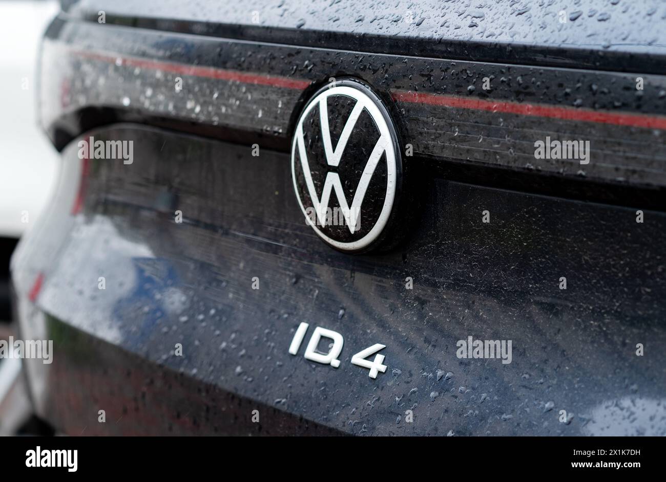 Kyiv, Ukraine. April, 2024. Back View gray Volkswagen ID.4 all-electric SUV-coupe car close up logo. LED rear lights and car design. Stock Photo