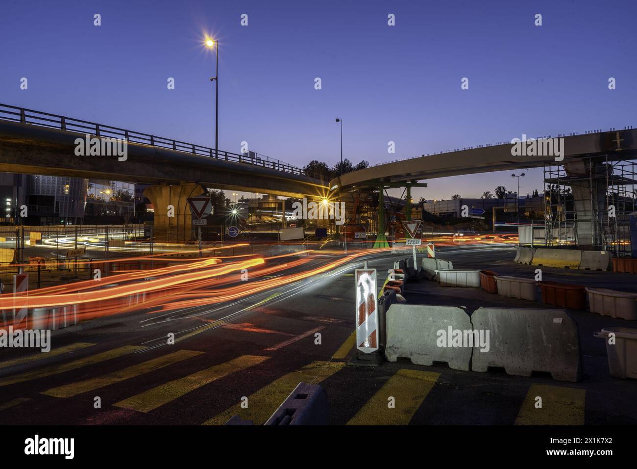 Junction under construction, motion blur, traffic. High quality photo. Blue hour Stock Photo
