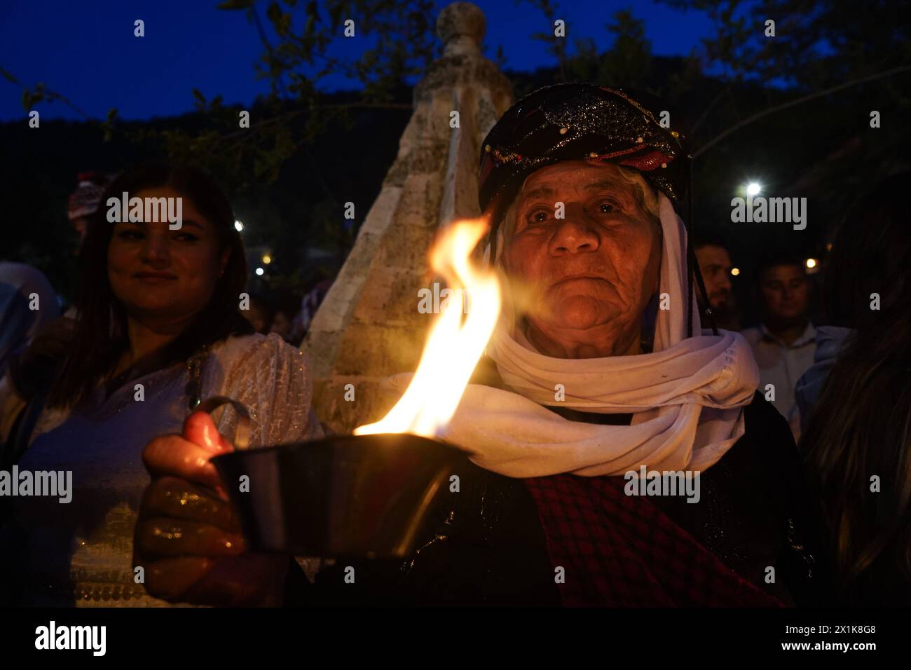 An Iraqi Yazidi Woman Lights Candles At Lalish Mountain Valley And ...