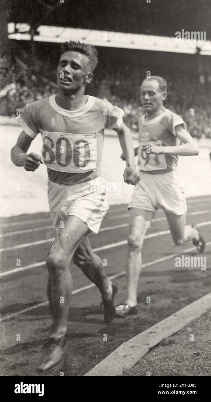 Paavo Nurmi defeating Ville Ritola to win the gold medal in the men's 10,000 metres event at the Olympic Games 1928 in Amsterdam. Stock Photo