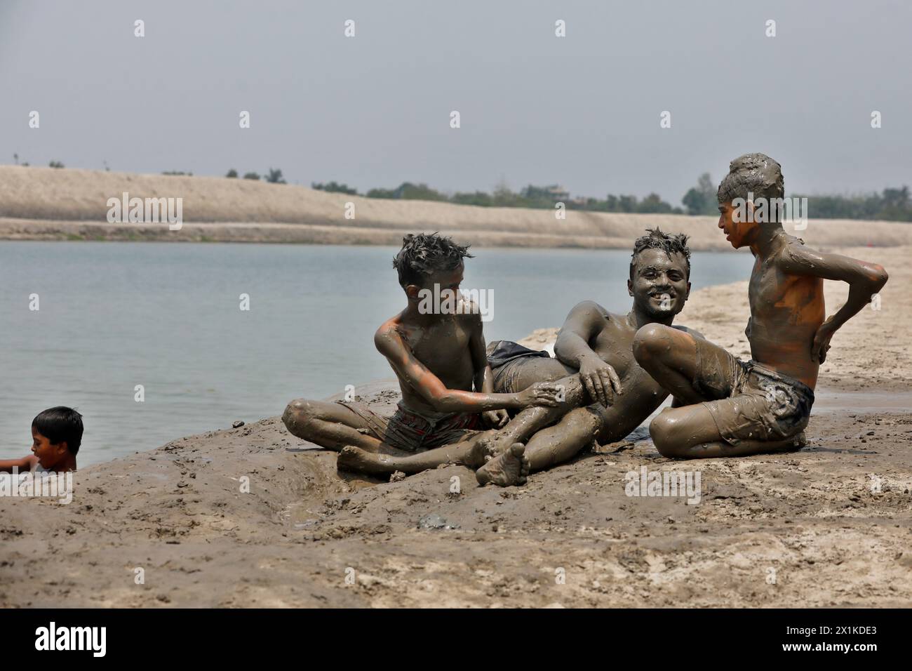 Khulna, Bangladesh - April 14, 2024: The brave children of the village are playing with clay at paikgacha in khulna, Bangladesh. Stock Photo