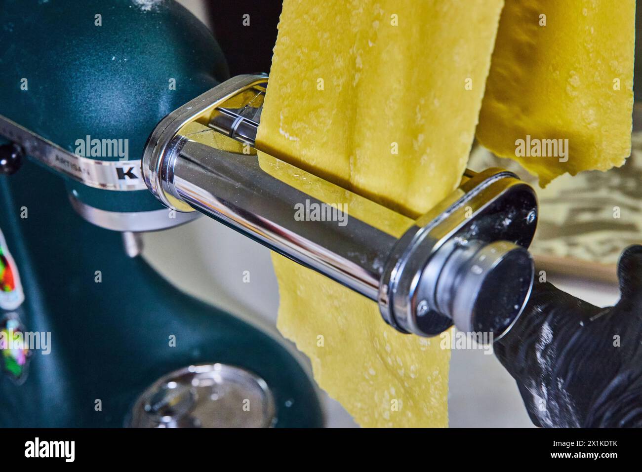 Homemade Pasta Dough in Maker, Kitchen Craftsmanship Close-Up Stock Photo