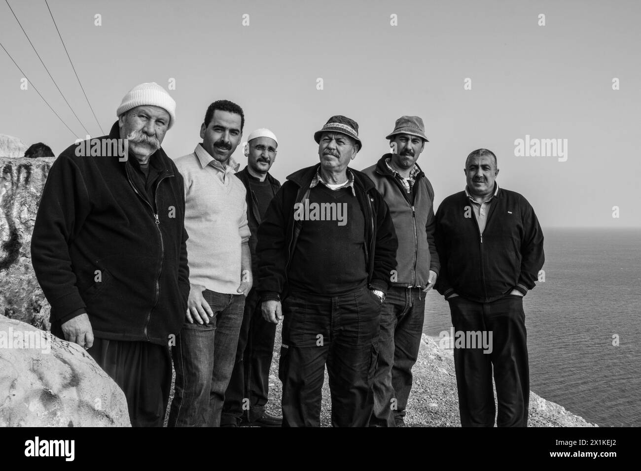 group of Druze men stand for a photo by the Dead Sea Stock Photo