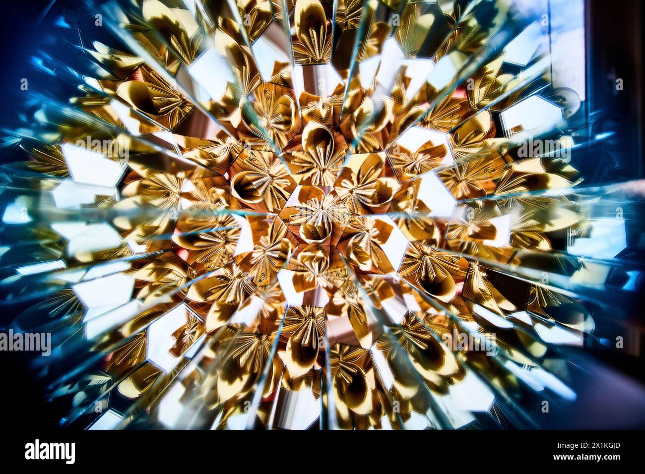 Golden Geometric Kaleidoscope Pattern with Ethereal Glow Stock Photo