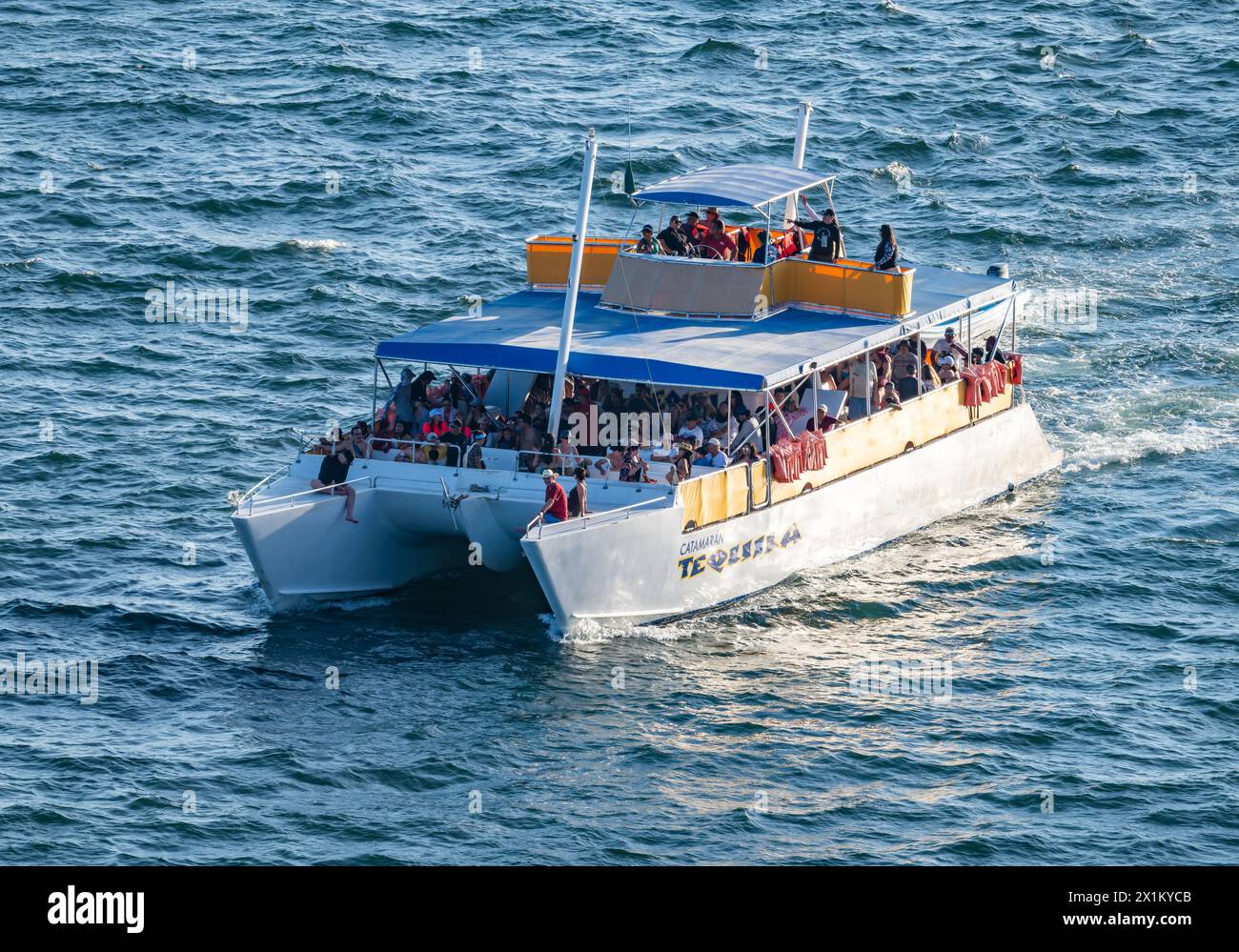 Tourists on a boat off the coast of Oaxaca, Mexico. Stock Photo