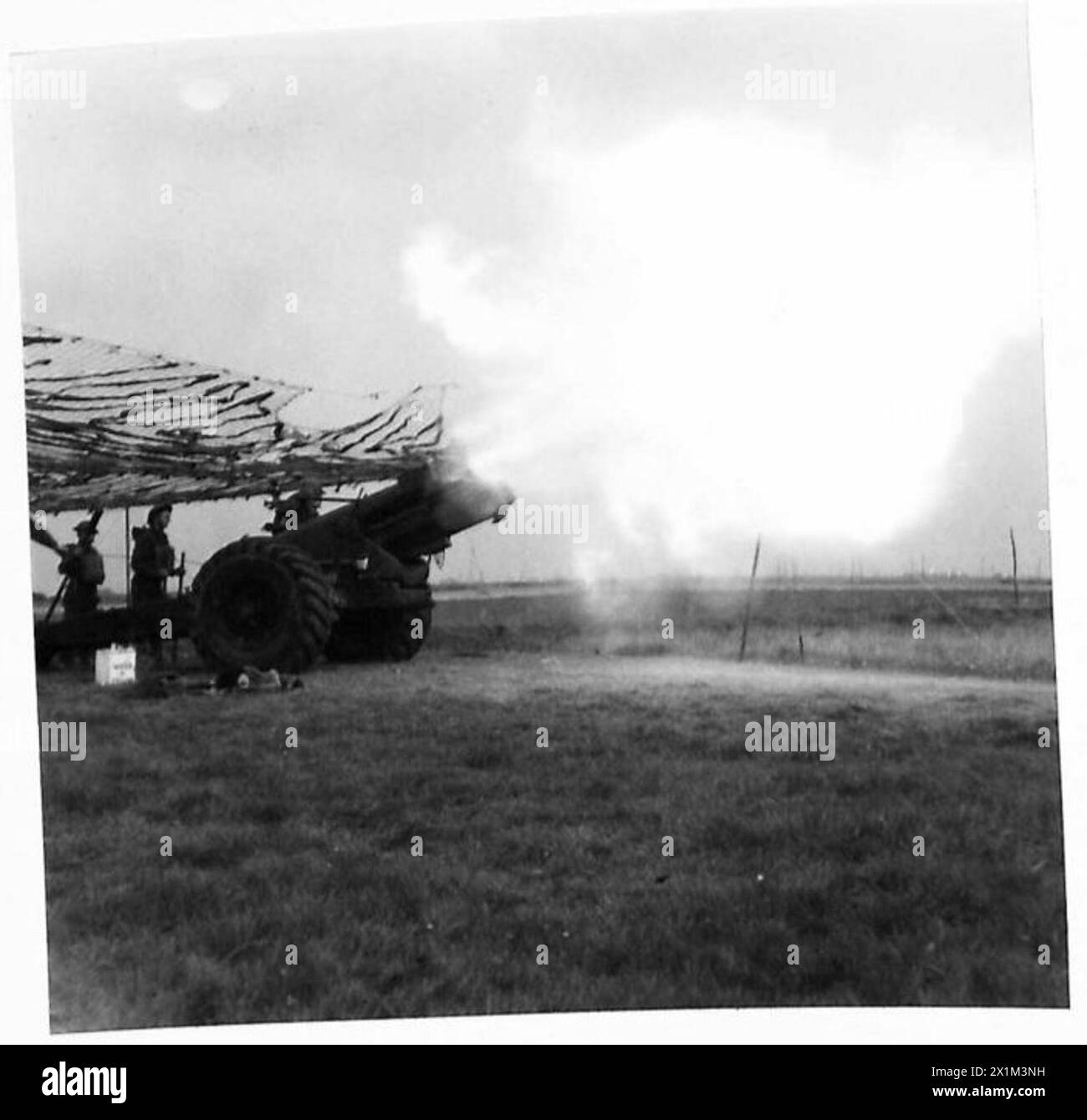 SIX INCH HOWITZERS IN ACTION - A fine picture showing a Howitzer being ...