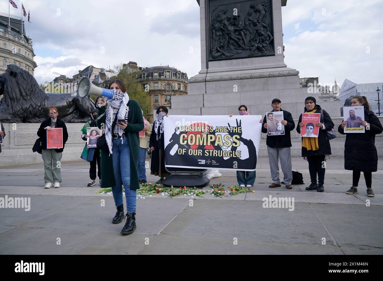 Members of the Palestinian Youth Movement hold a Palestinian Prisoner's Day vigil in Trafalgar Square, London, to commemorate Palestinian prisoners who have been held by Israeli forces since the Hamas attack on Israel in October 2023. Picture date: Wednesday April 17, 2024. Stock Photo