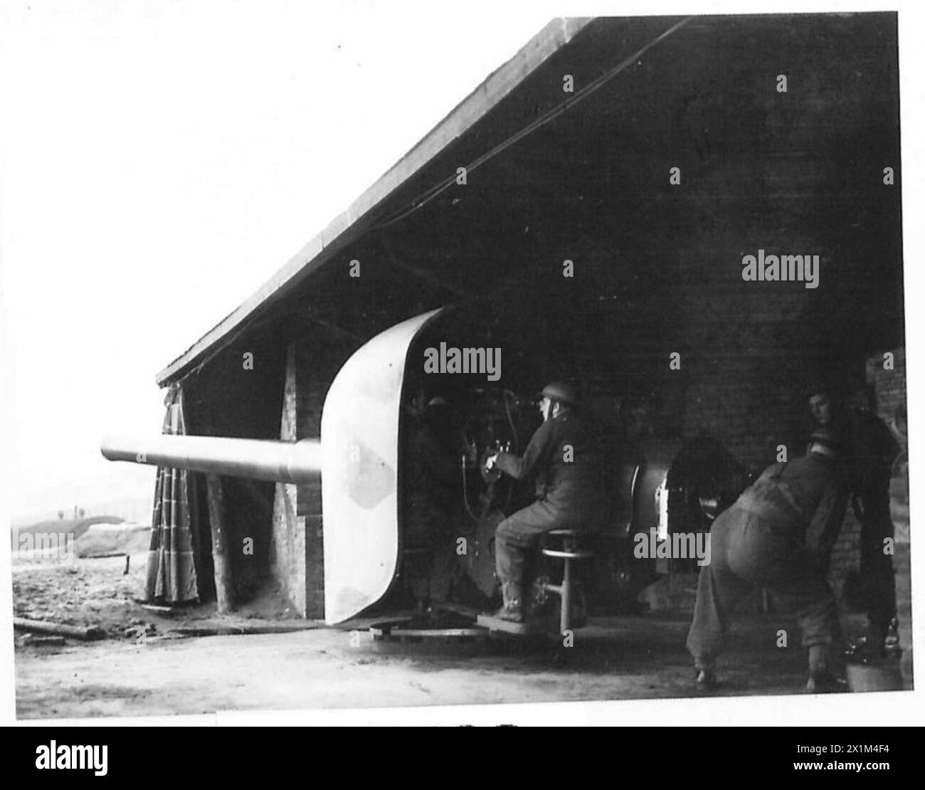 GUNNERY PRACTICE IN SCOTLAND - A six-inch gun in one of the fixed ...