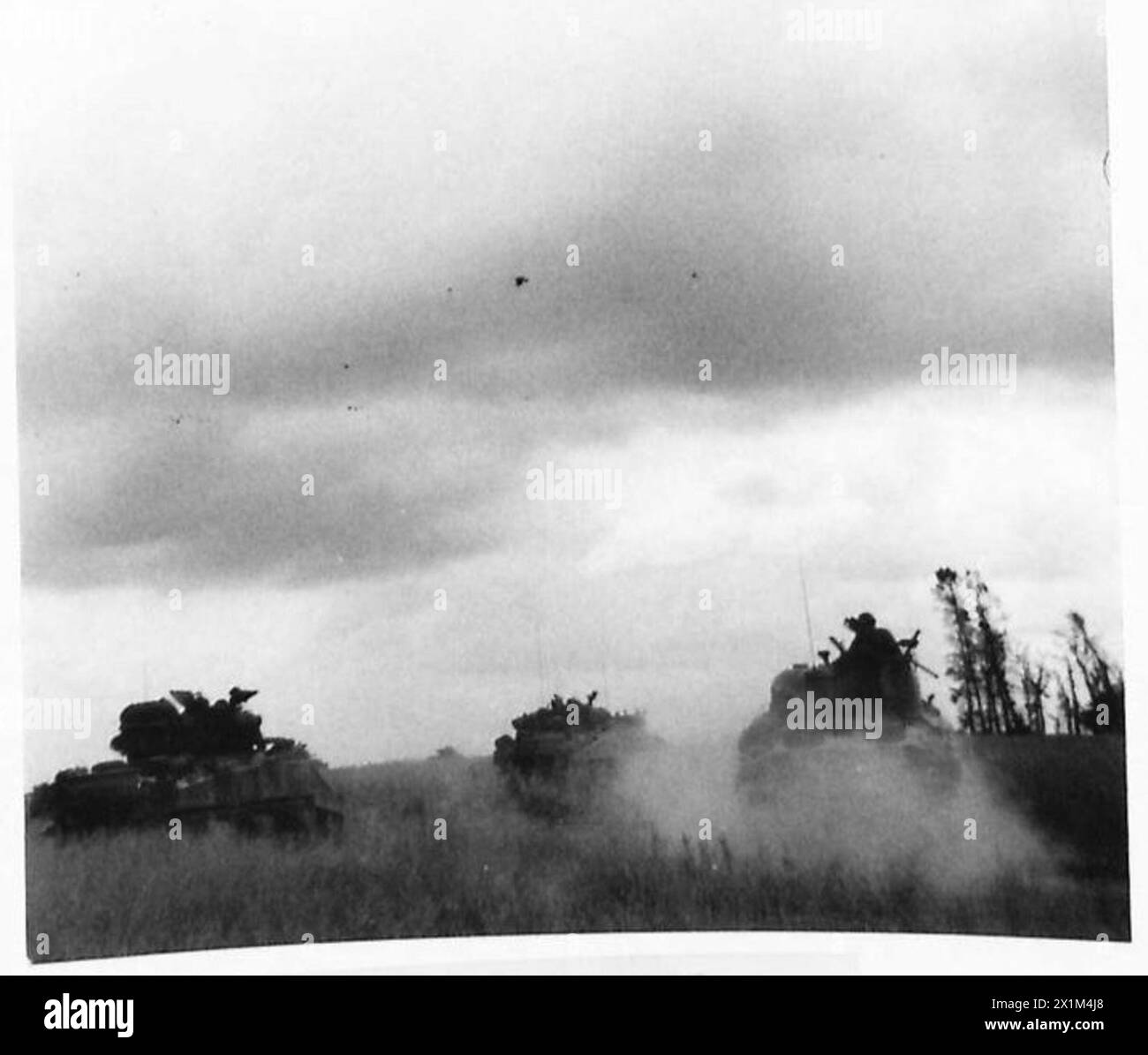 the-british-army-in-north-west-europe-1944-1945-sherman-tanks-moving