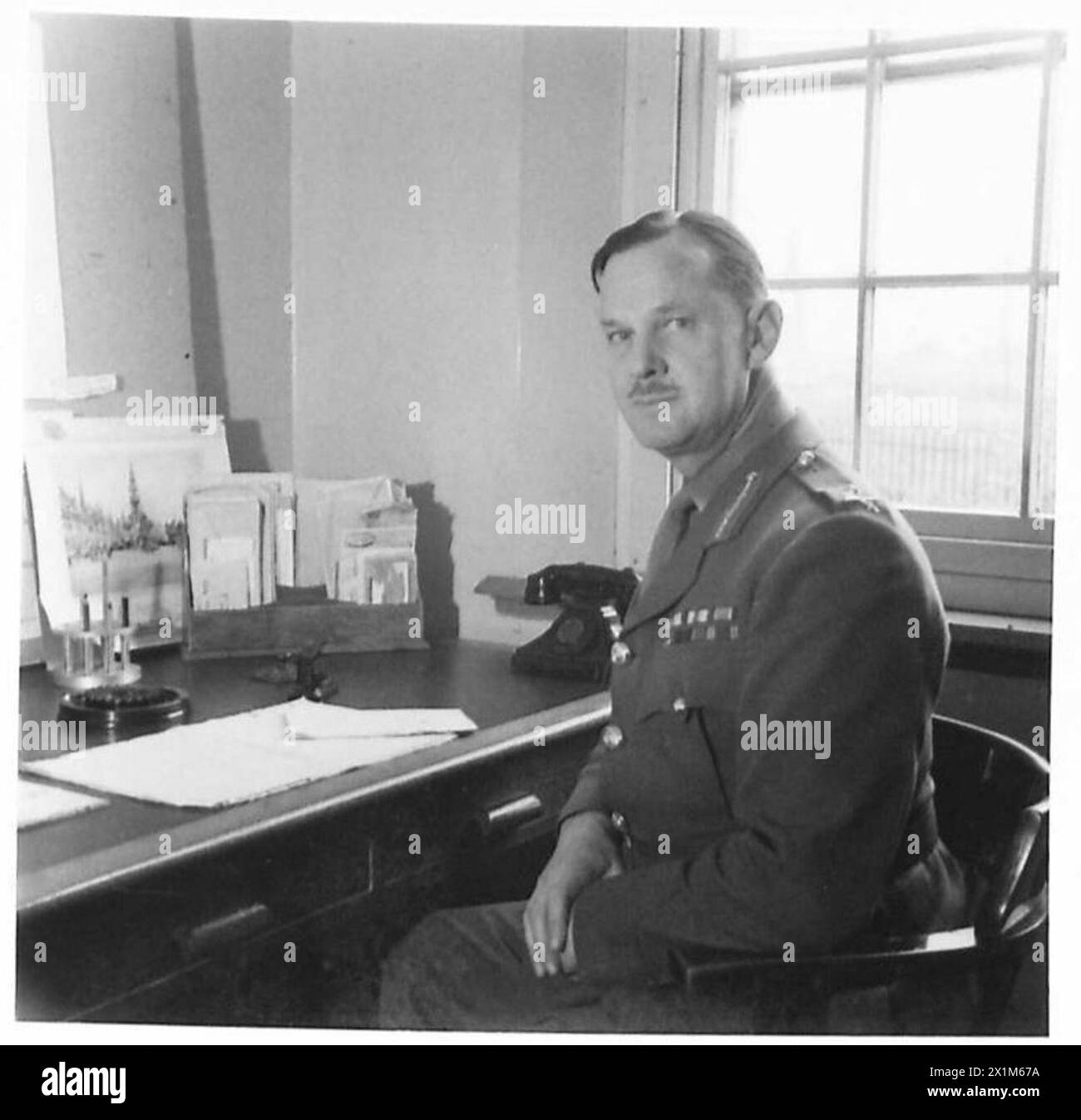 Negative major general l m cox obe mc commander north wales