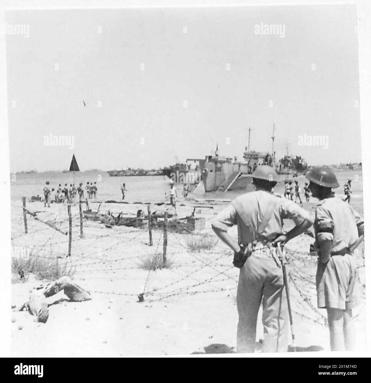 INVASION OF SICILY - General view as landing craft unload, British Army Stock Photo