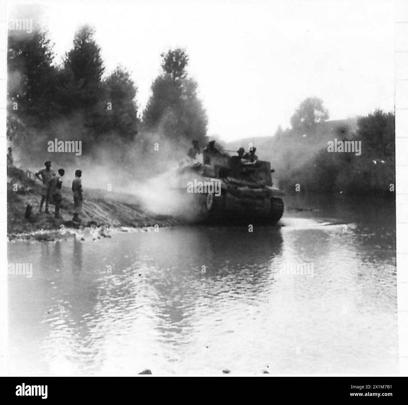 An Eighth Army Sexton self-propelled gun crosses the ford over the River Foglia during the attack on the Gothic Line, Italy. Stock Photo
