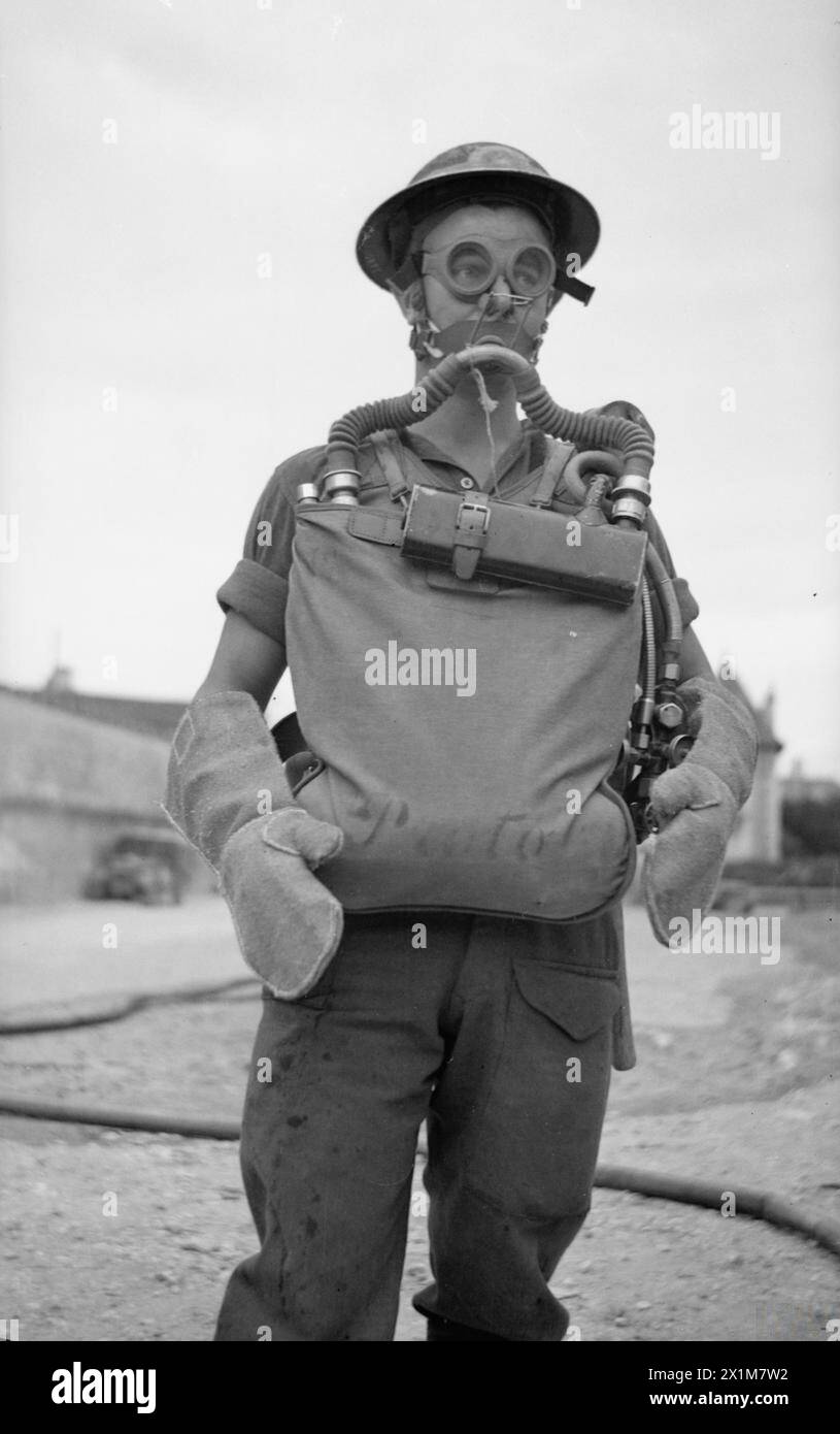 Private R. Thorpe of the British Army Fire Service company in Caen ...