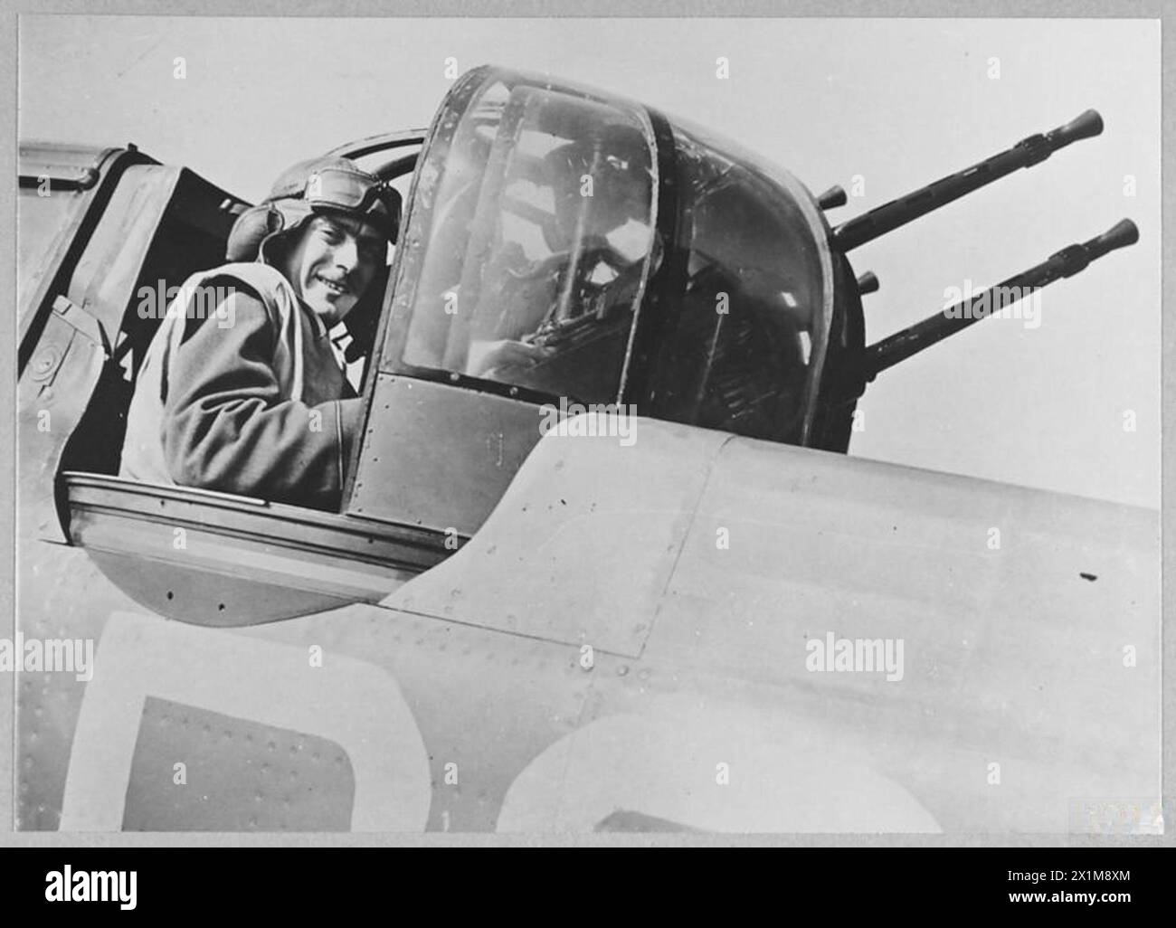 THE BATTLE OF BRITAIN 1940 - An air gunner in the turret of a Boulton Paul Defiant of No. 264 Squadron at Kirton in Lindsey, August 1940, Royal Air Force Stock Photo