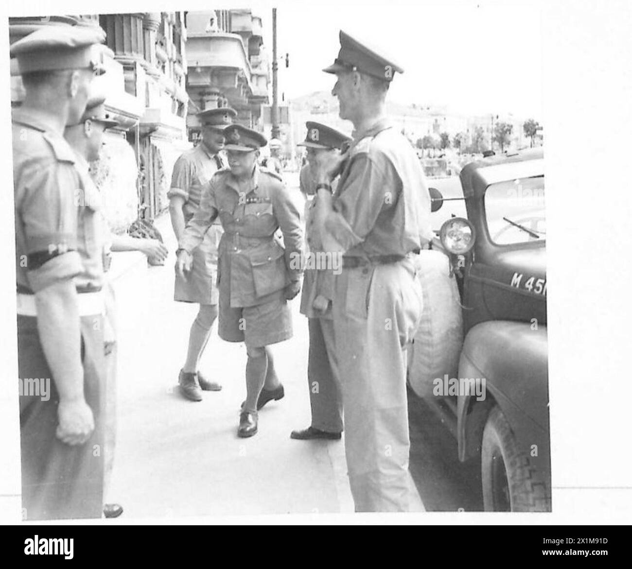 TRIESTE CONFERENCE - Lieut. General NcCreery and party alight from a car outside 55 ARea H.Q, British Army Stock Photo