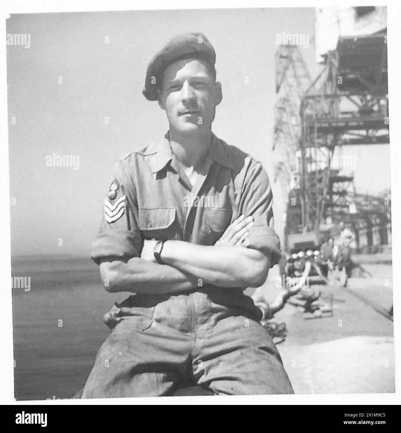EIGHTH ARMY PERSONALITIES - Another member of the 1015 Port Operating Company R.E., who has seen service in most ports in North Africa and Italy is Sgt. W. Owen of 22, King's Avenue, Muswell Hill, London, British Army Stock Photo