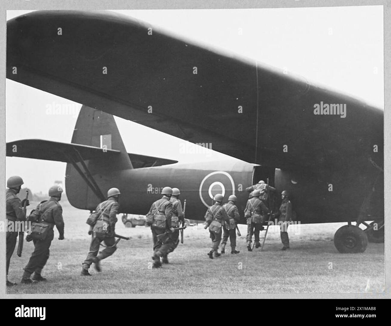 Airborne troops board a glider during training or operational ...