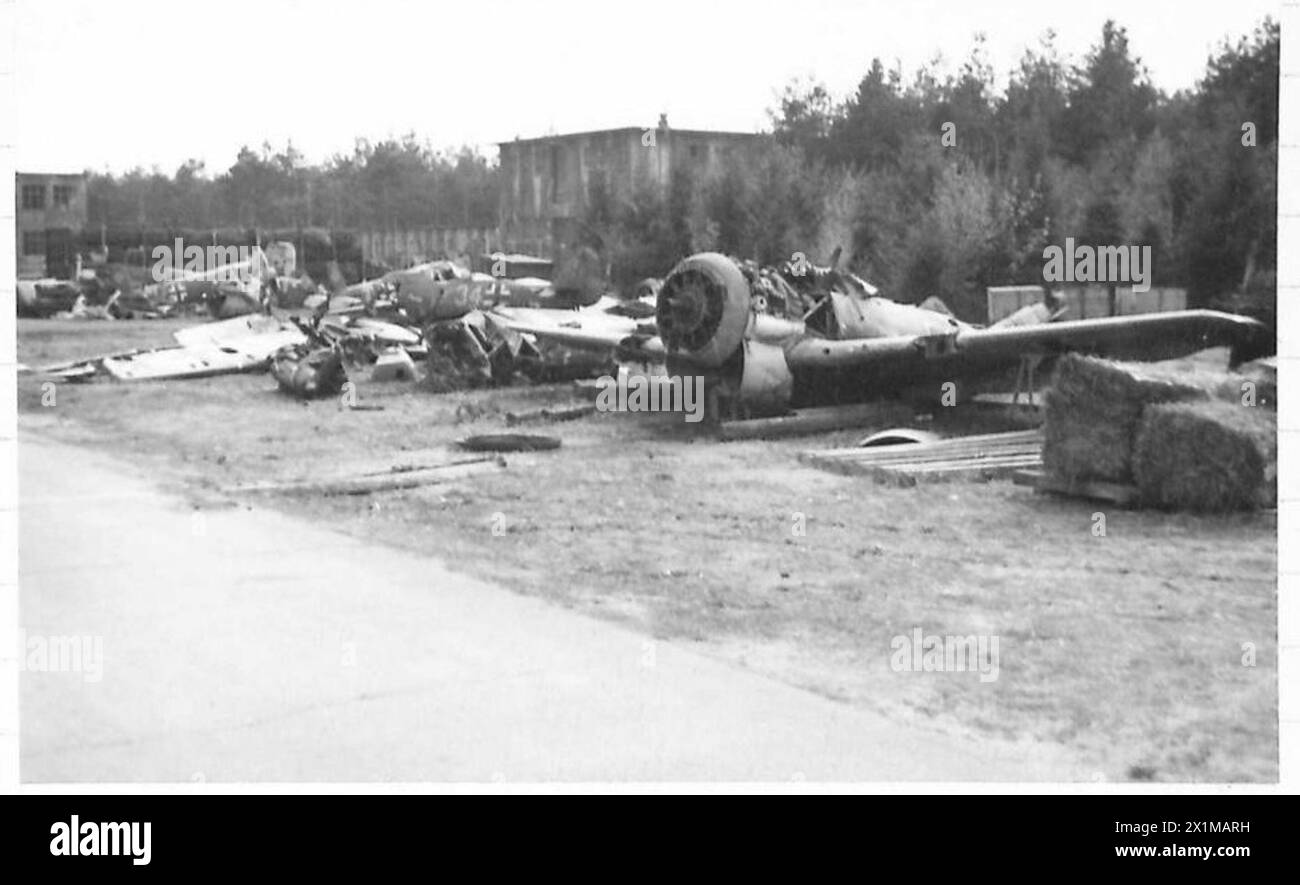 BRITISH TROOPS REACH THE ELBE - German aircraft lying derelict on an ...