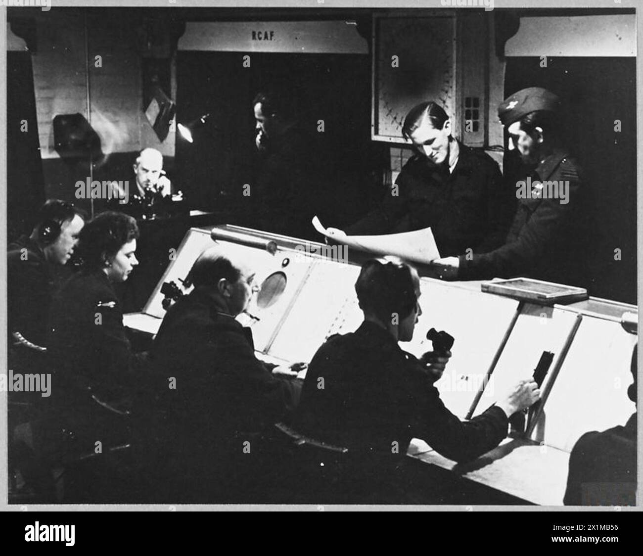 LANCASTER 'N' FOR NUTS BOMBS PARIS RAILWAY YARDS - 12868 Picture (issued 1944) shows - The control room during the operation, Royal Air Force Stock Photo