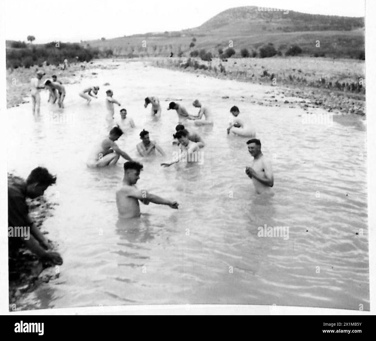 Men of the 2nd Battalion Coldstream Guards, First Army, bathe in a ...