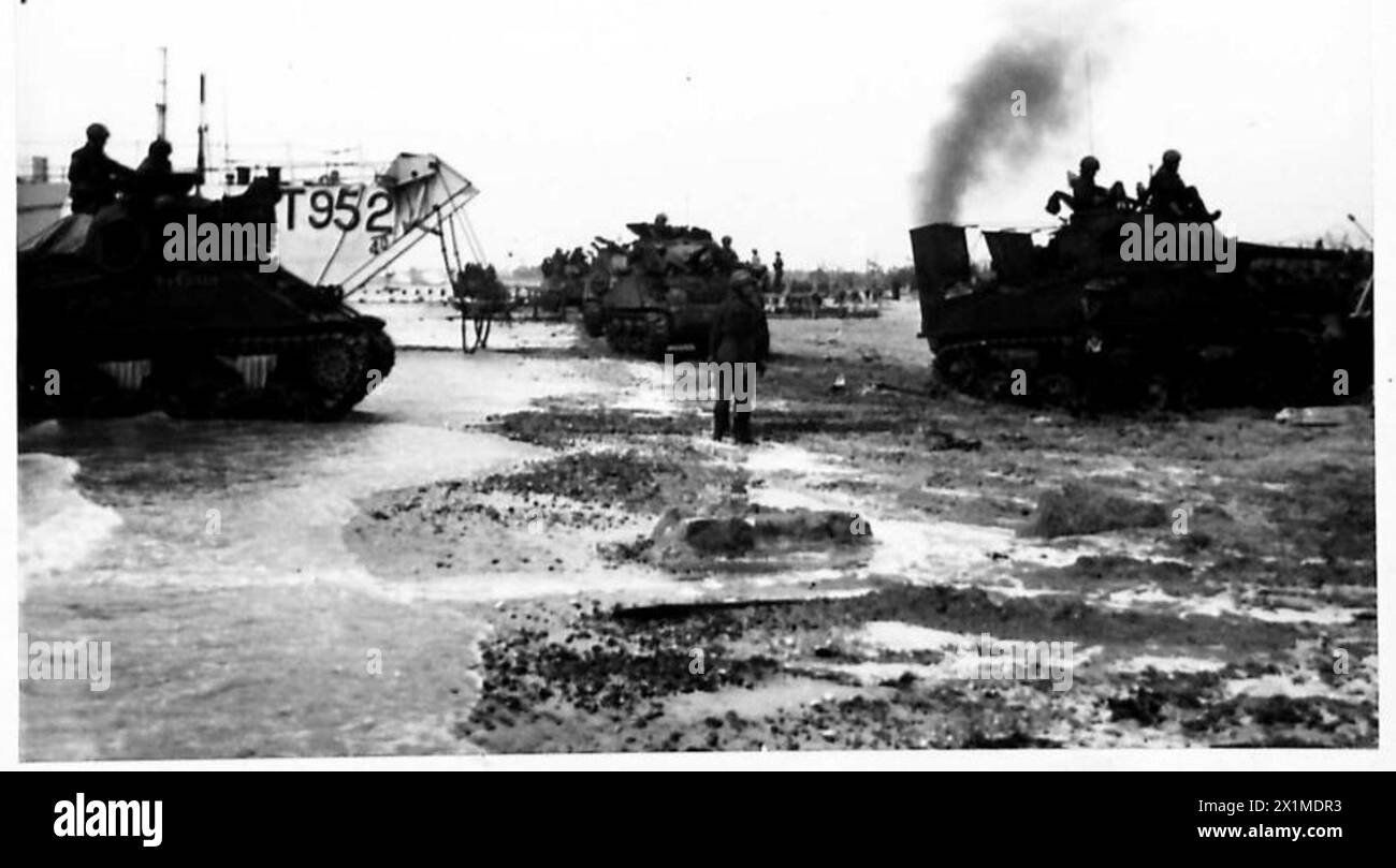 BRITAIN'S ARMY TRAINS FOR THE INVASION OF EUROPE - Tanks landing on the beach, British Army Stock Photo