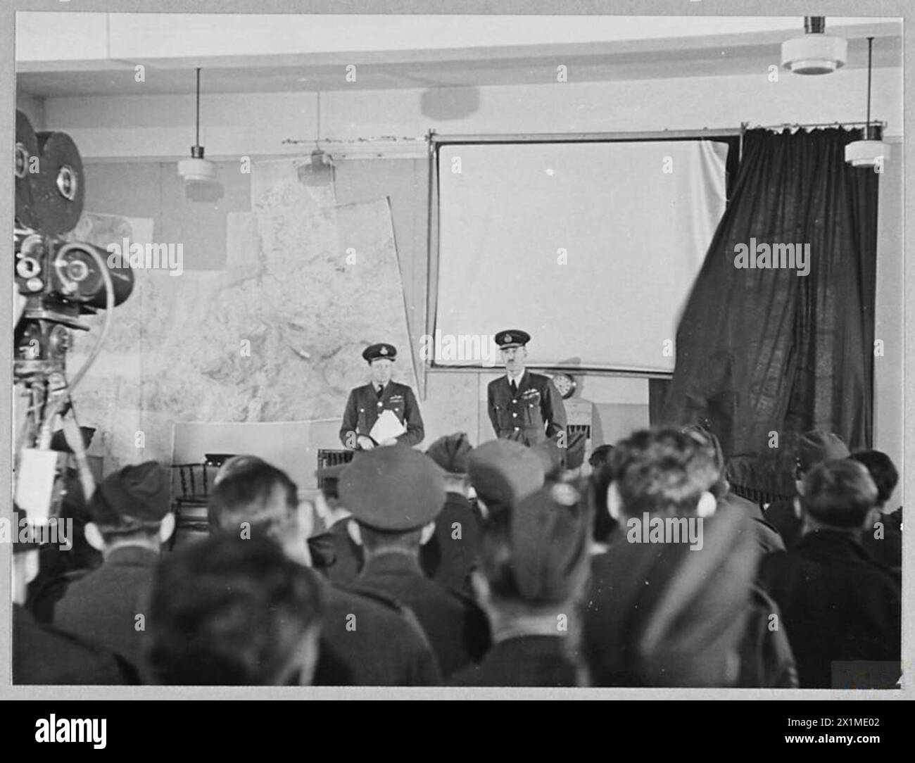 The Air Officer Commanding and Group Captain brief RAF aircrews in 1942 ...