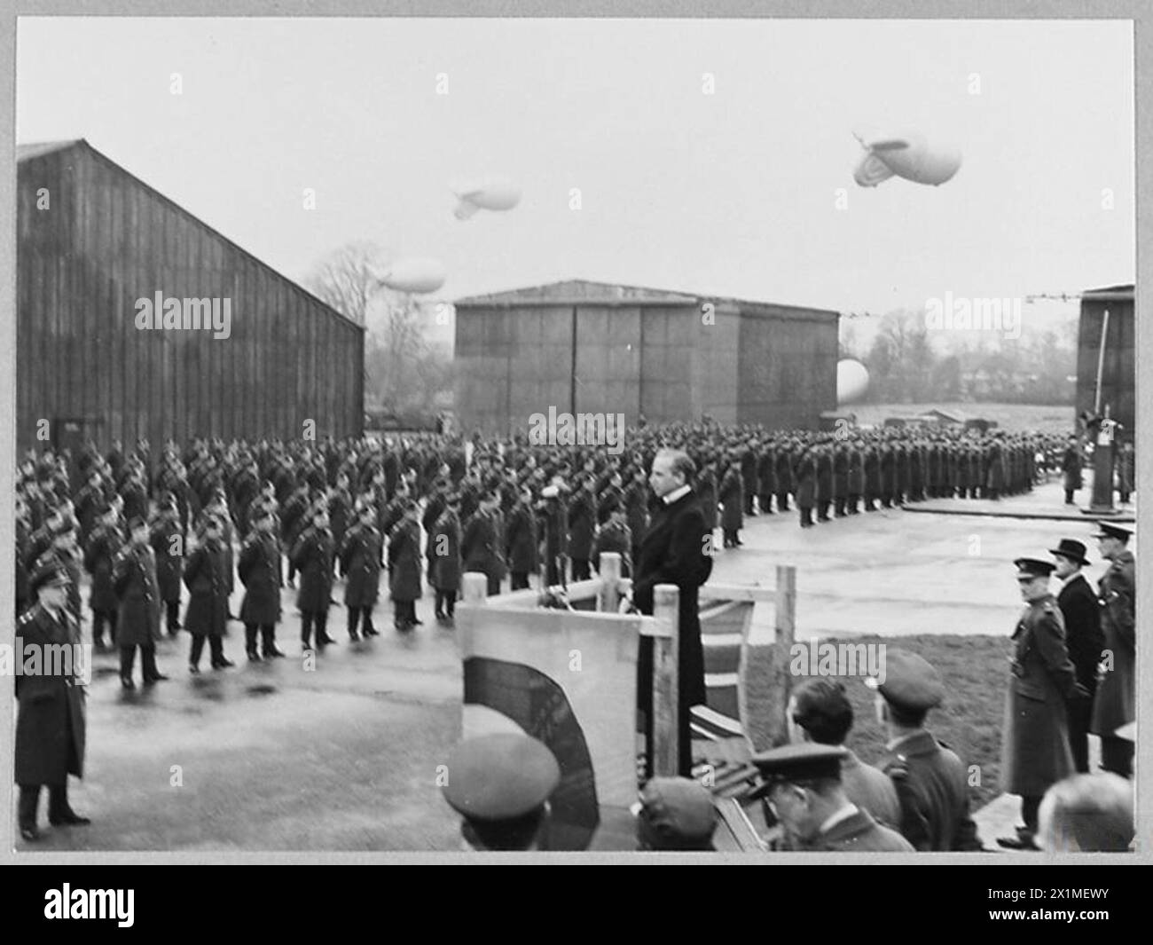 STAND DOWN PARADE OF R.A.F. BALLOON COMMAND - The stand-down of R.A.F. Balloon command was announced by Sir Archibald Sinclair, Secretary of State for Air, at a parae at the Command's headquarters on 5th February 1945. The Air Minister addressing the parade, Royal Air Force Stock Photo
