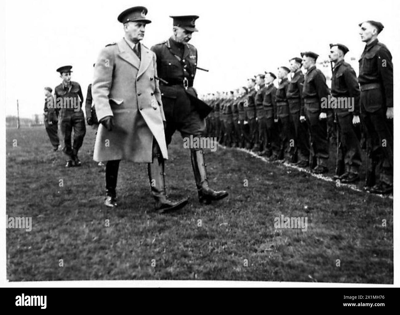 H.R.H. THE DUKE OF GLOUCESTER IN NORTHERN IRELAND - Left to right - Lt.Gen.Sir Henry R.Pownall, GOC-in-C.,BTNI., Major General Pakenham-Walshe, GOC.,NID., seen together during H.R.H. the Duke of Gloucester's visit to the Gloucester Regiment, British Army Stock Photo