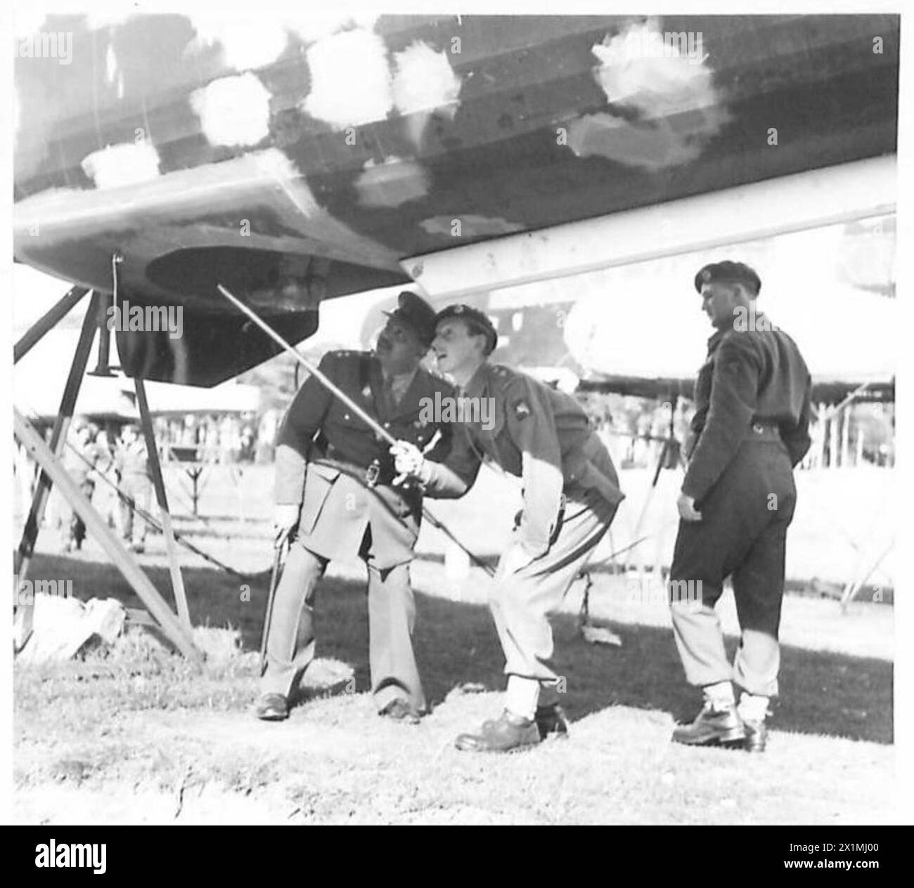 His Highness inspects the hatchway used by paratroops for airborne drops in the British Army. Stock Photo