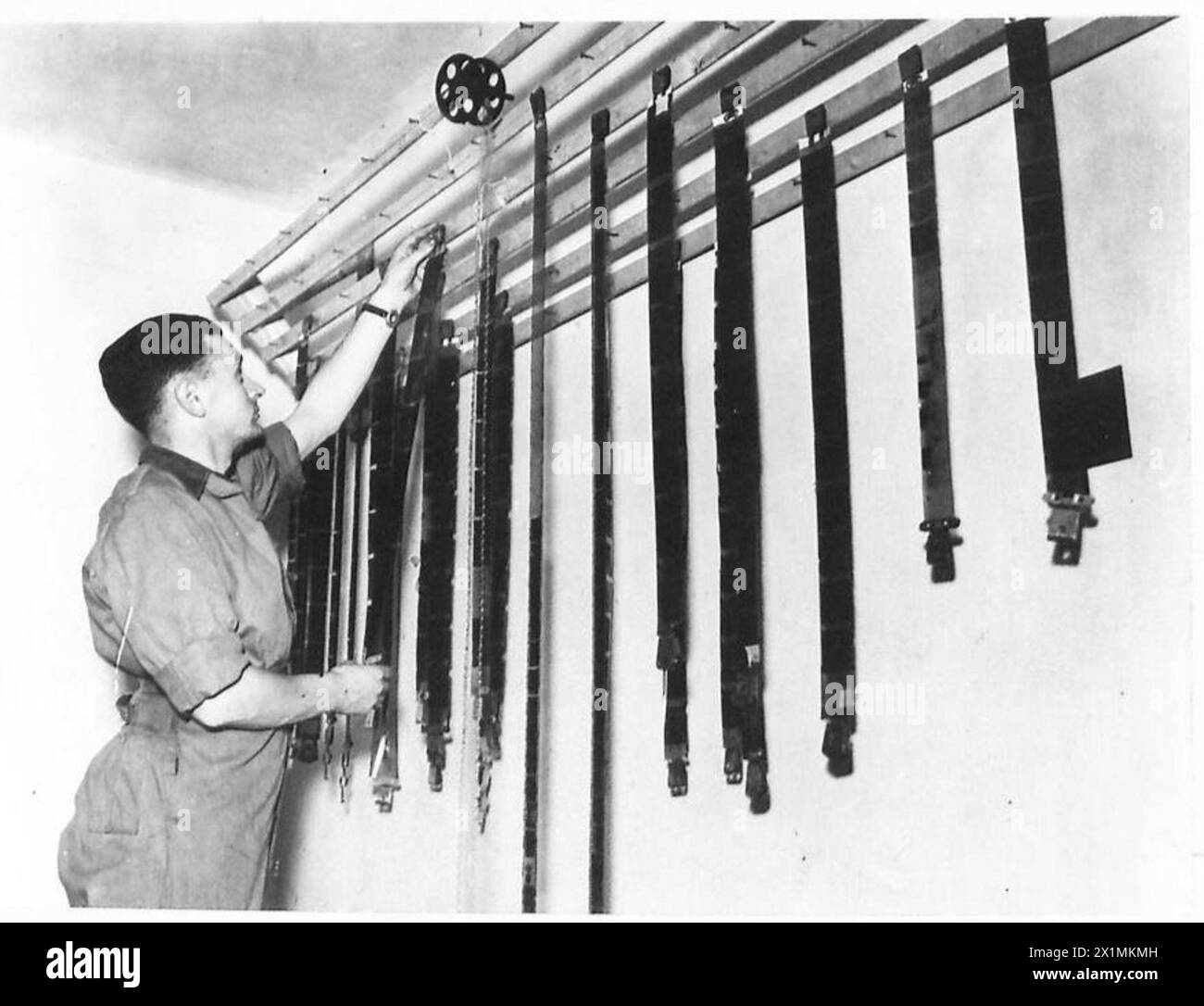 THE ARMY FILM AND PHOTOGRAPHIC UNIT - The drying racks in the developing room , British Army Stock Photo