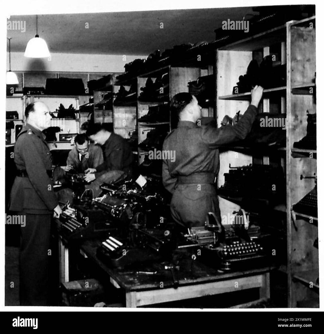 TYPEWRITER REPAIR DEPARTMENT Taking stock of the many machines which