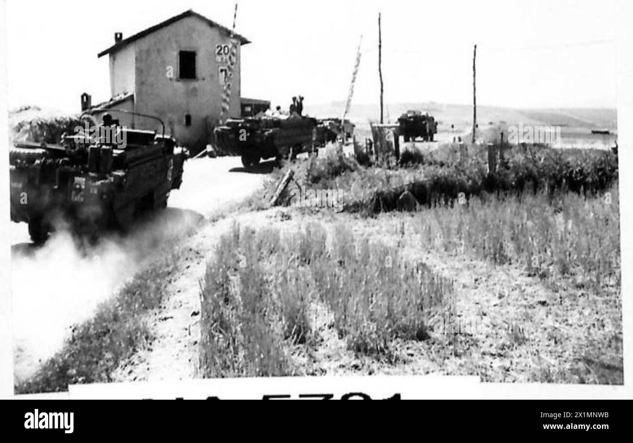 Move Inland Sign American amphibious vehicles move inland from Liberty ships to supply ...