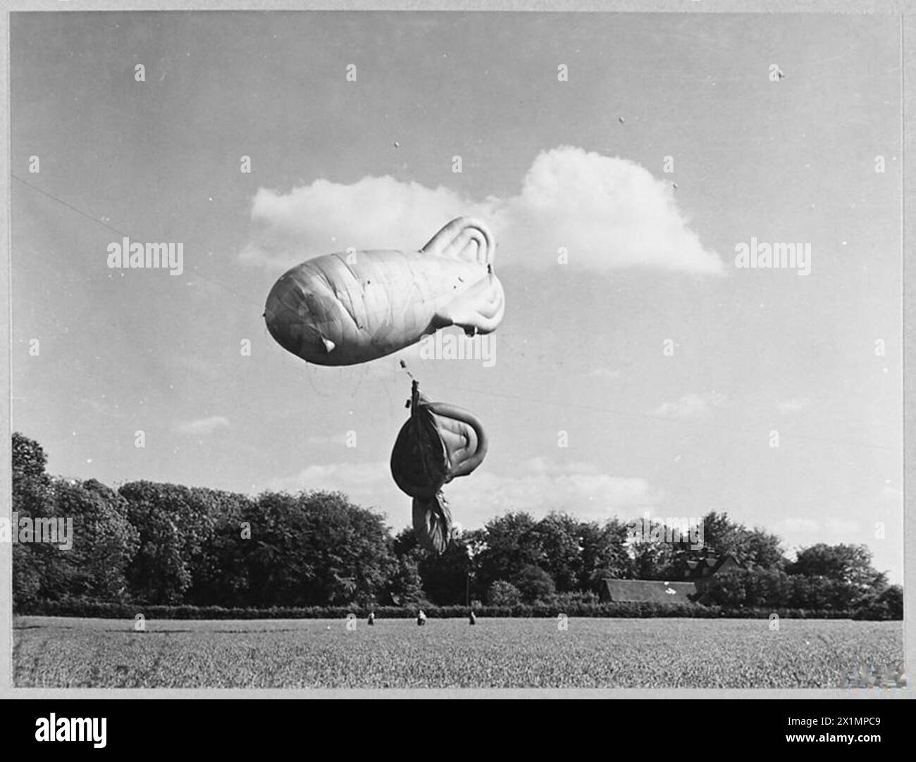 Tangle Bomb Two balloons are tangled at a Royal Air Force Balloon Defence site in ...