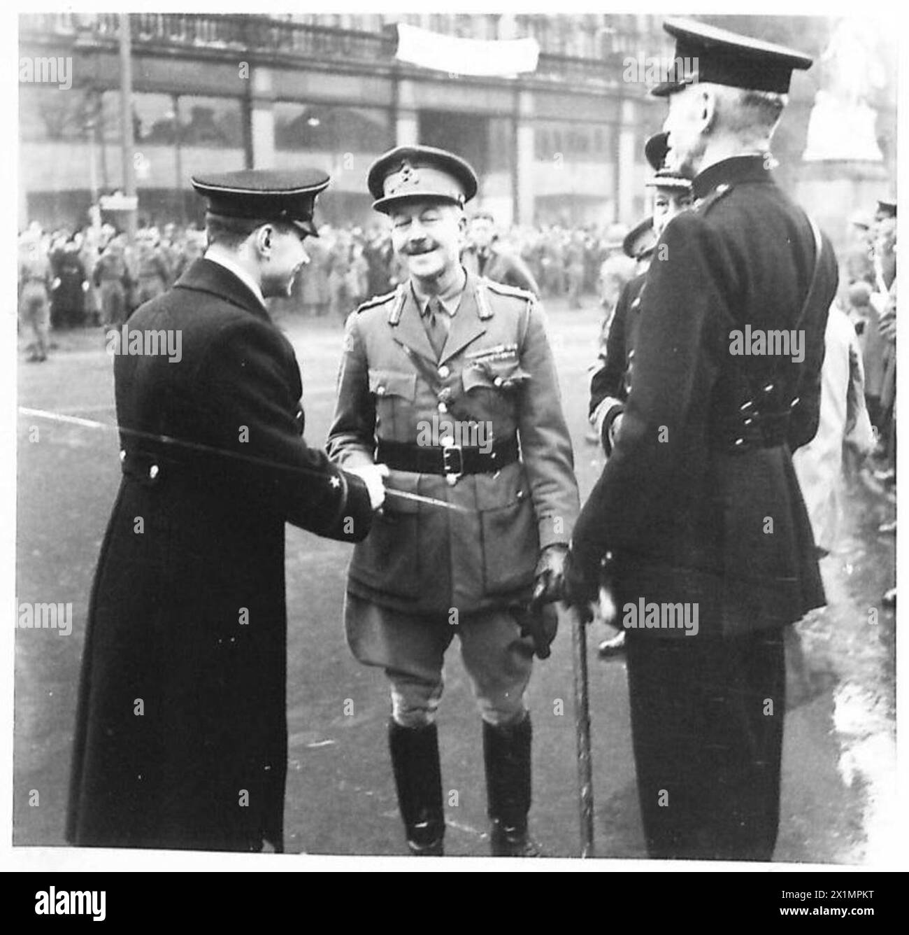 RED ARMY DAY CELEBRATED IN NORTHERN IRELAND - Major General V.H.B. Majendie, CB.,DSO., (GOC..NID) greets Naval Lieutenant Elagin who represented the Embassy of the U.S.S.R. London during the Red Army Day, British Army Stock Photo