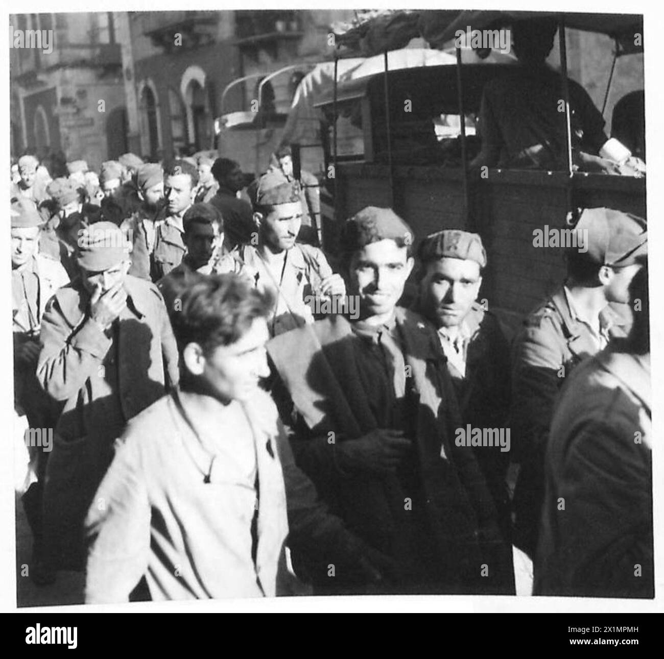 Italian prisoners are taken by British Army forces in Vizzini during ...