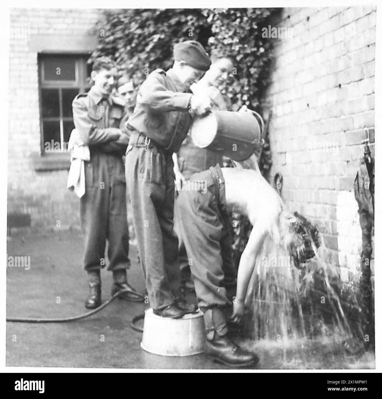 ARMY CADETS FORCE IN CAMP - Standing on the fence to get a better view