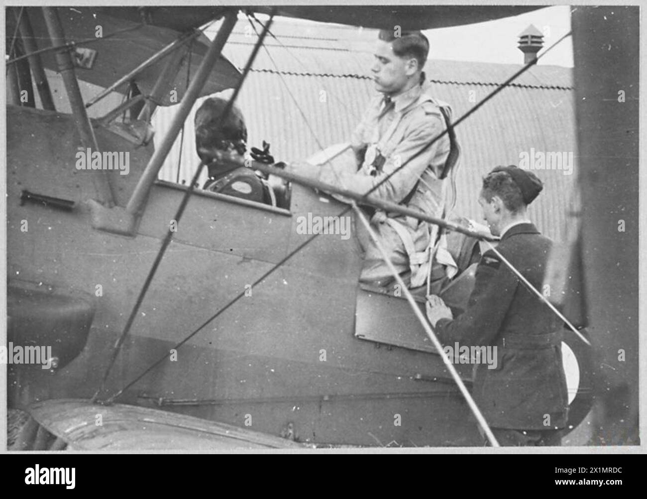 A pilot receives practical instruction in an Air Training Corps ...
