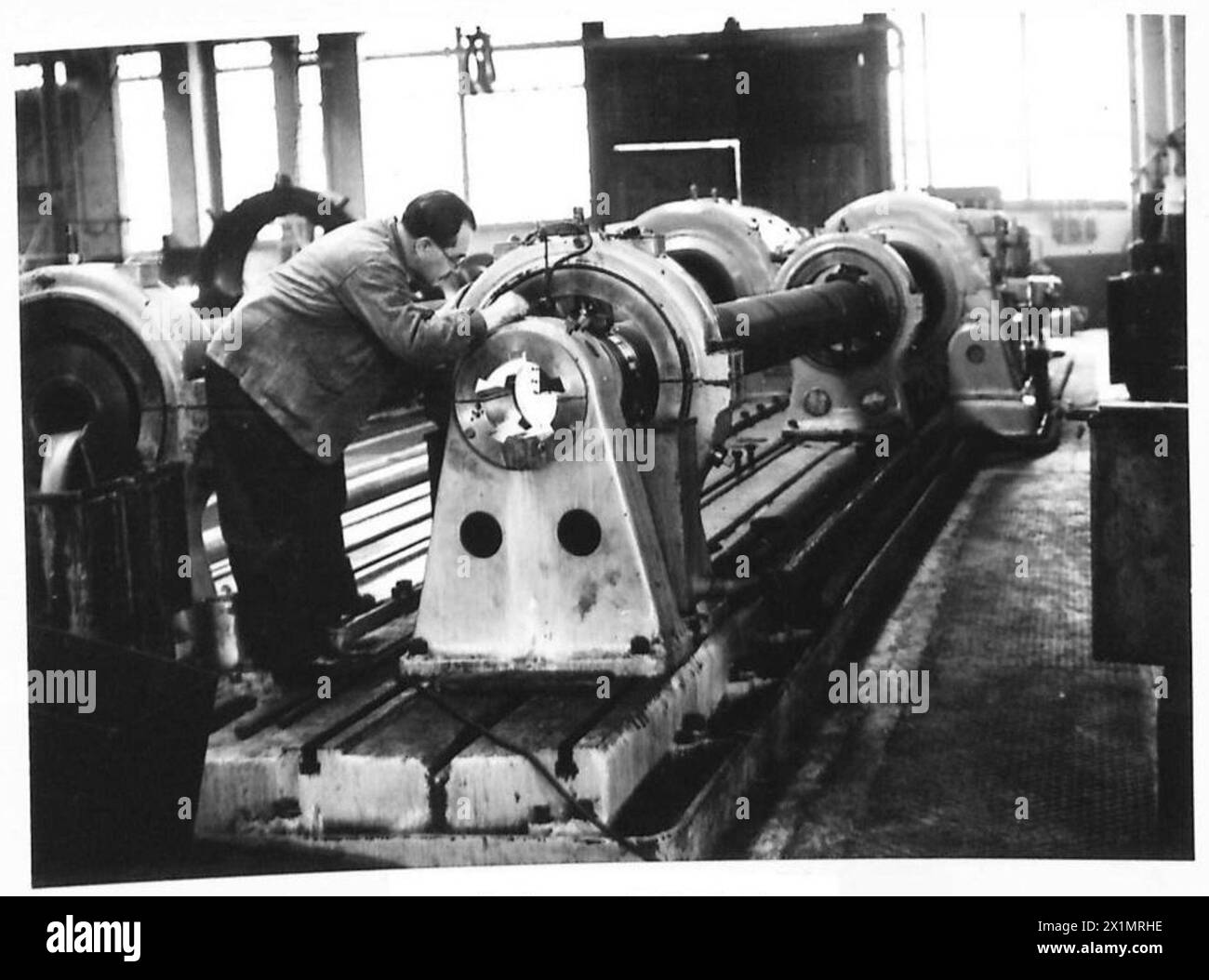 WOOLWICH ARSENAL MAKING BIG GUNS - The barrel of a 9.2" gun being
