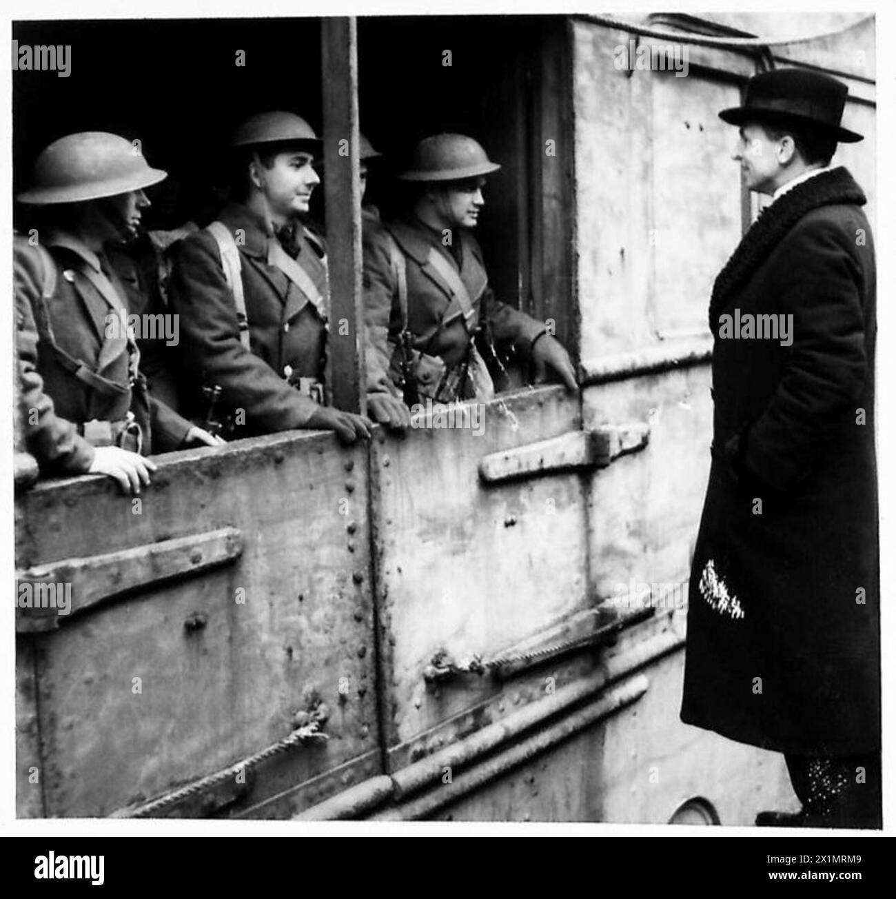 Sir Archibald Sinclair is pictured speaking to United States troops at ...