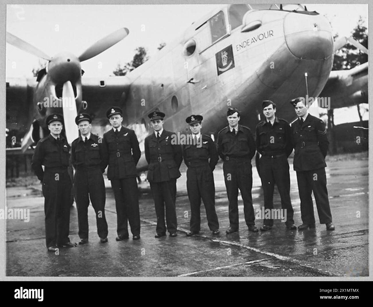 THE DUKE OF GLOUCESTER'S YORK AIRCRAFT - For introduction see CH.14653. Picture (issued 1945) shows - The full crew of the York aircraft - left to right - Wing Commander D.R.Donaldson - Captain of the Duke's flight; Flight Lieutenant J.A. Critchley, DFC - Second Pilot Flying Officer J.G. Earl - Navigator; Flying Officer K.W. Miller - Flight Engineer; Pilot Officer L.E. Wolldon - Wireless Operator; Sergeant P.G. Allan - Fitter; Corporal S.N.Robertson - Rigger; Corporal J.A. Houston - Steward. It is an all-Australian crew, Royal Air Force Stock Photo