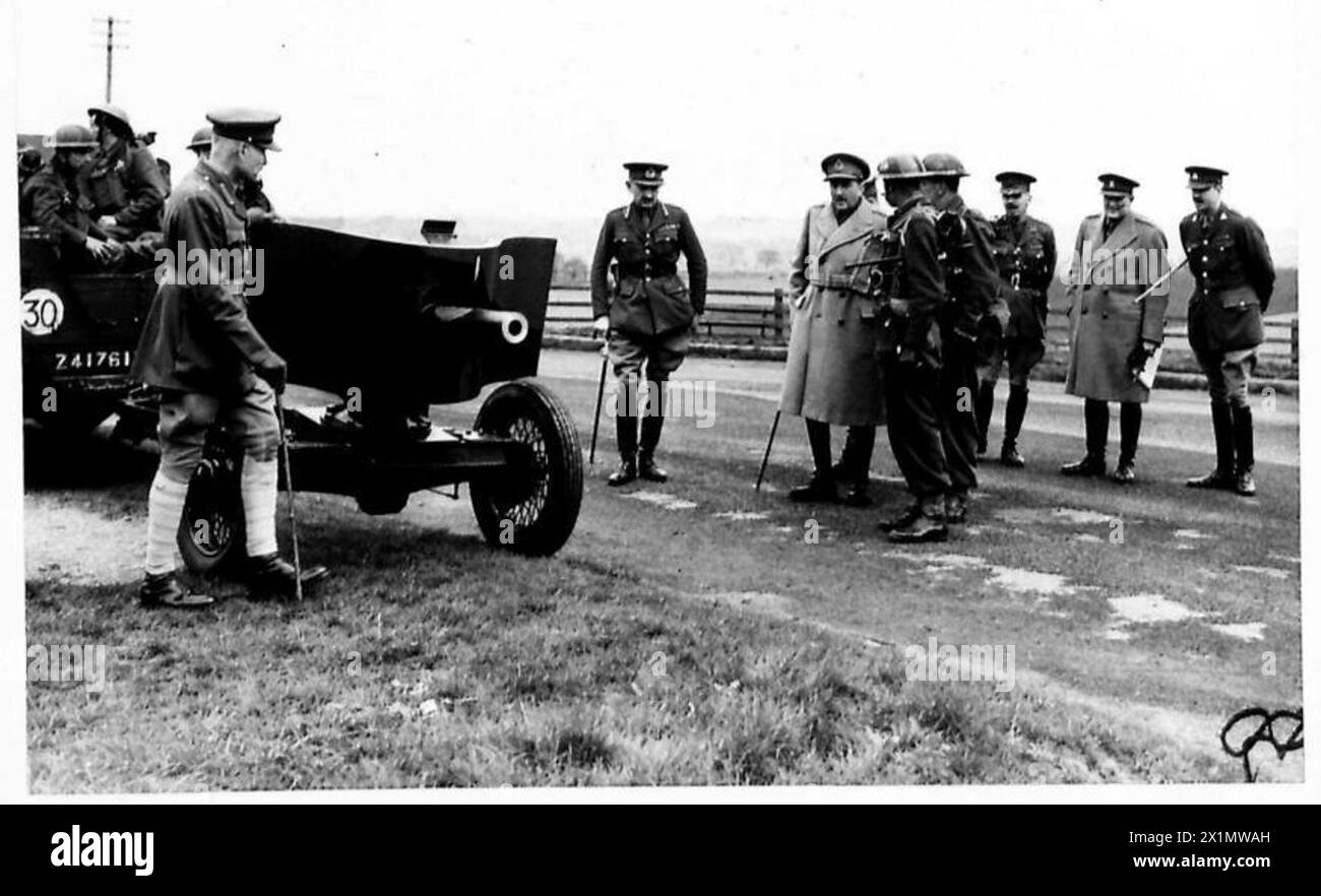 The General Officer Commanding-in-Chief inspects a mobile gun during a ...