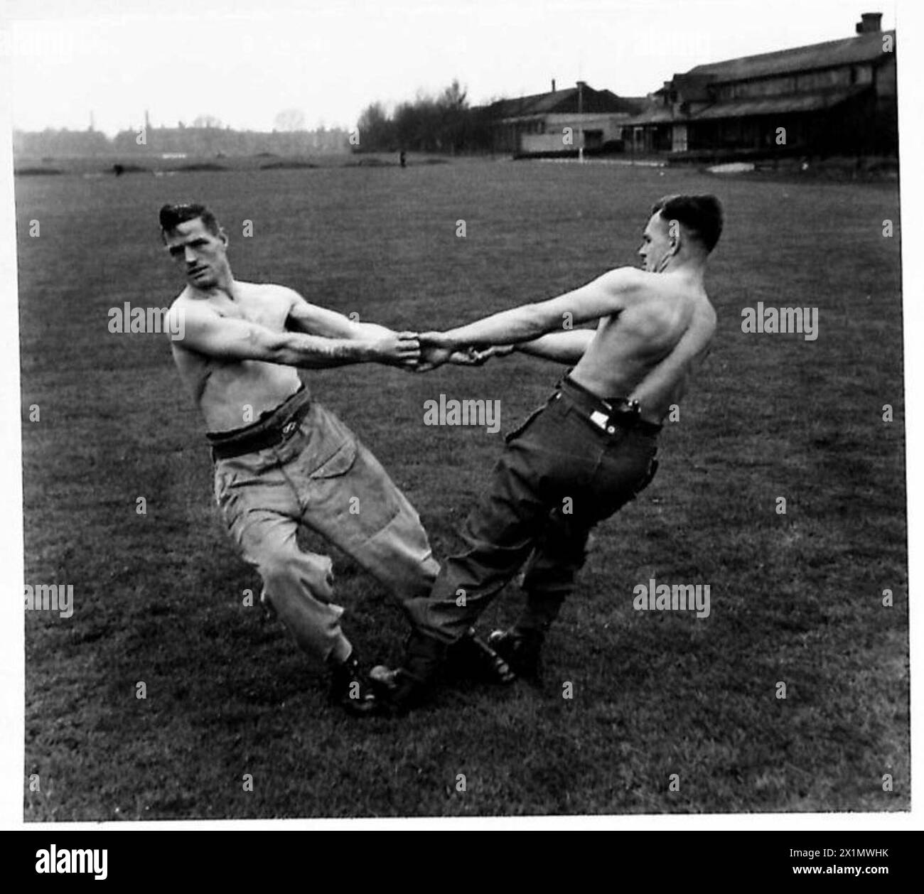 PHYSICAL TRAINING PICTURES Series of photographs of 'pulling and