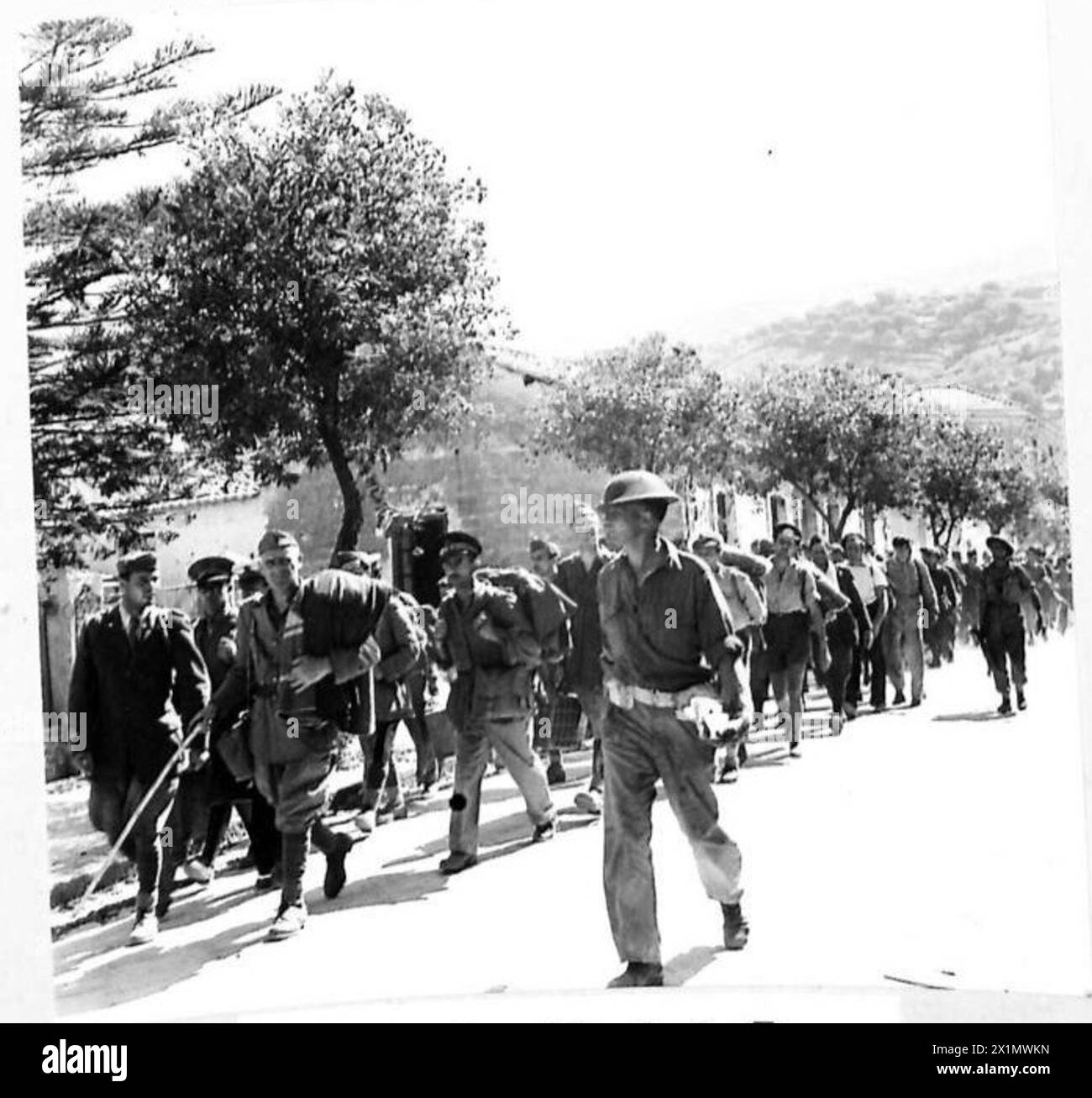 British troops capture enemy soldiers while advancing on rear positions ...