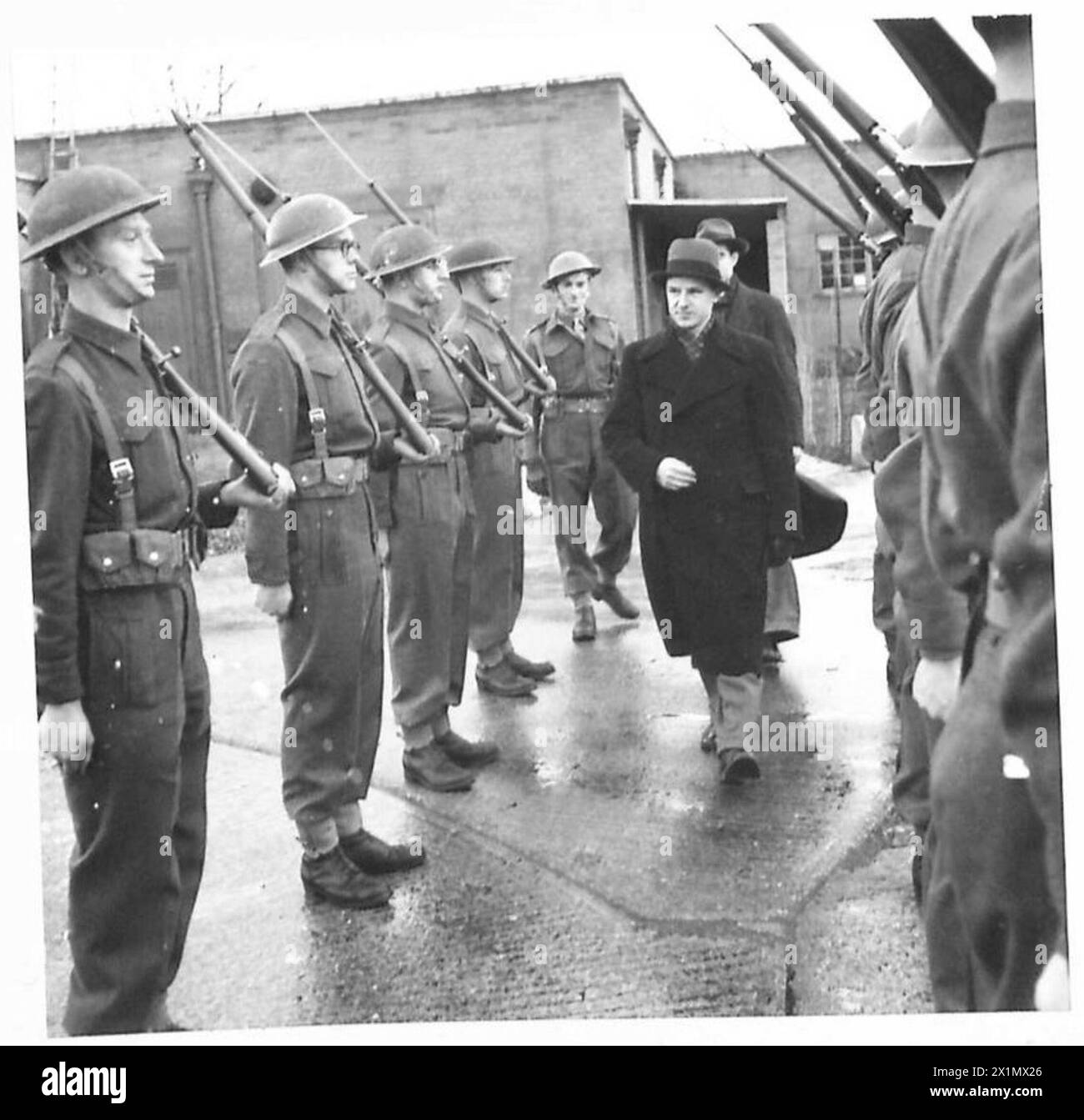 Soviet representatives inspect Army Film Unit trainees forming a guard ...