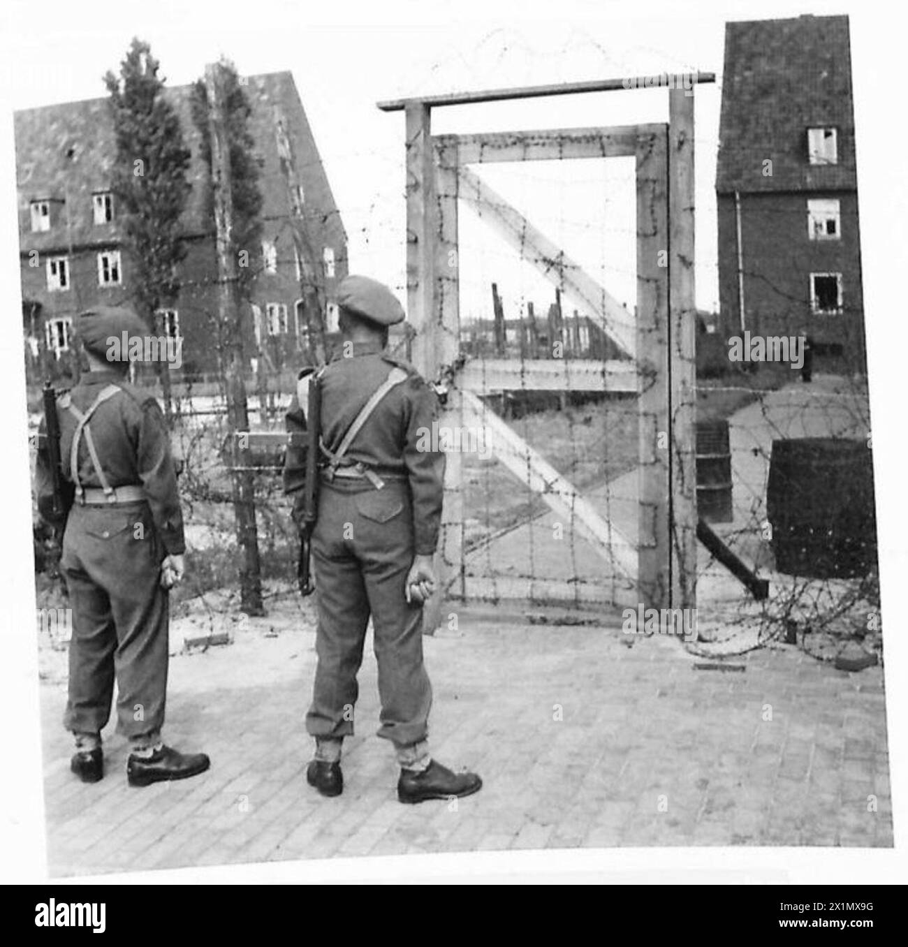 GERMAN POLITICAL PRISONERS CAMP - The double guard at one of the ...