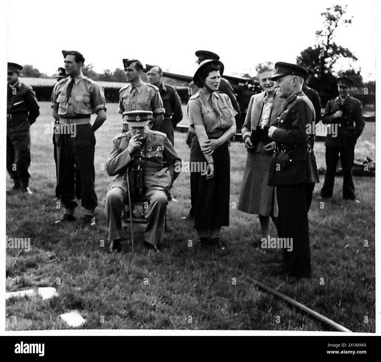 MR. CHURCHILL SEES ANTI-FLYING BOMB DEFENCES - The Prime Minister and Mrs. Churchill met their A.T.S. daughter, Subaltern Mary Churchill at a Mixed Heavy A.A. Battery they visited. On right - General Sir Frederick Pile, British Army Stock Photo